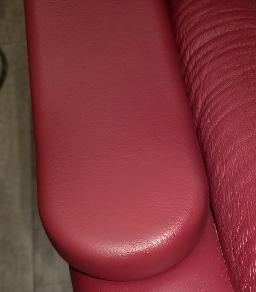 Dental chair armrest after leather repair
